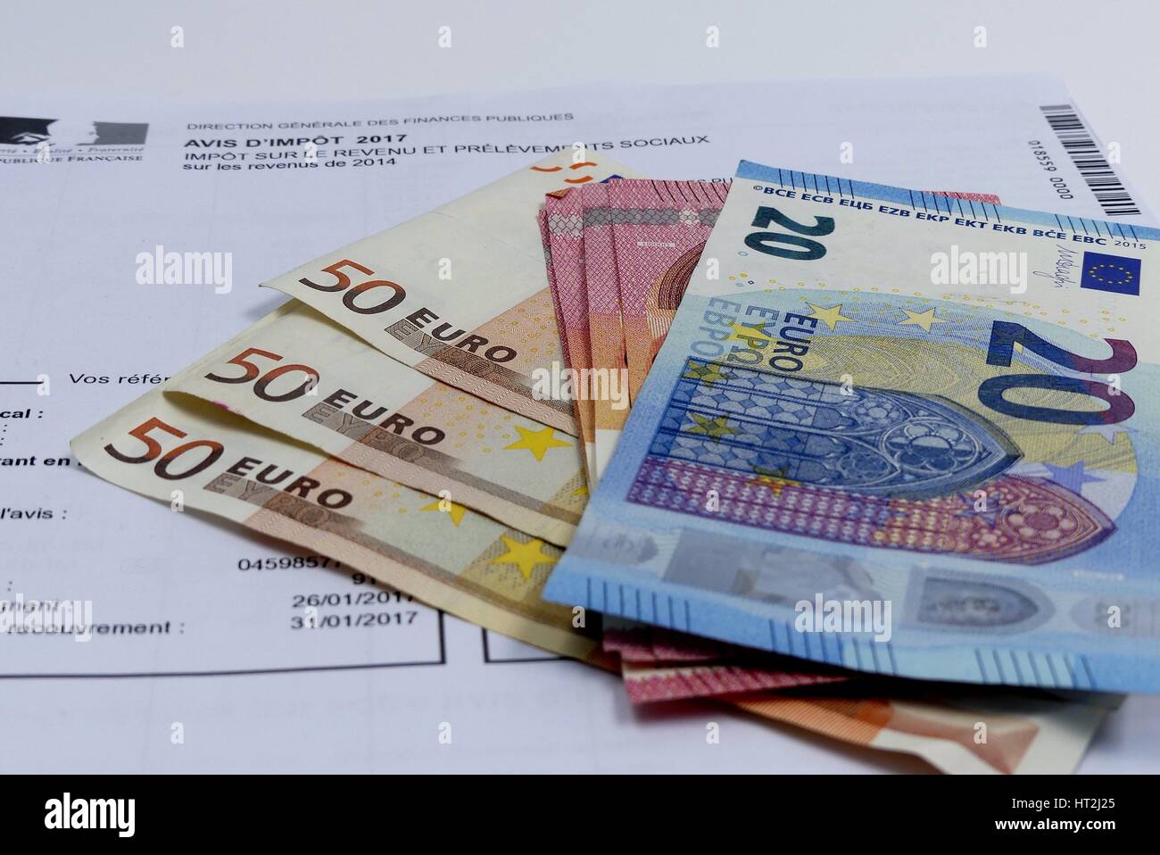 French tax form and euros bank notes. Financial concept Stock Photo