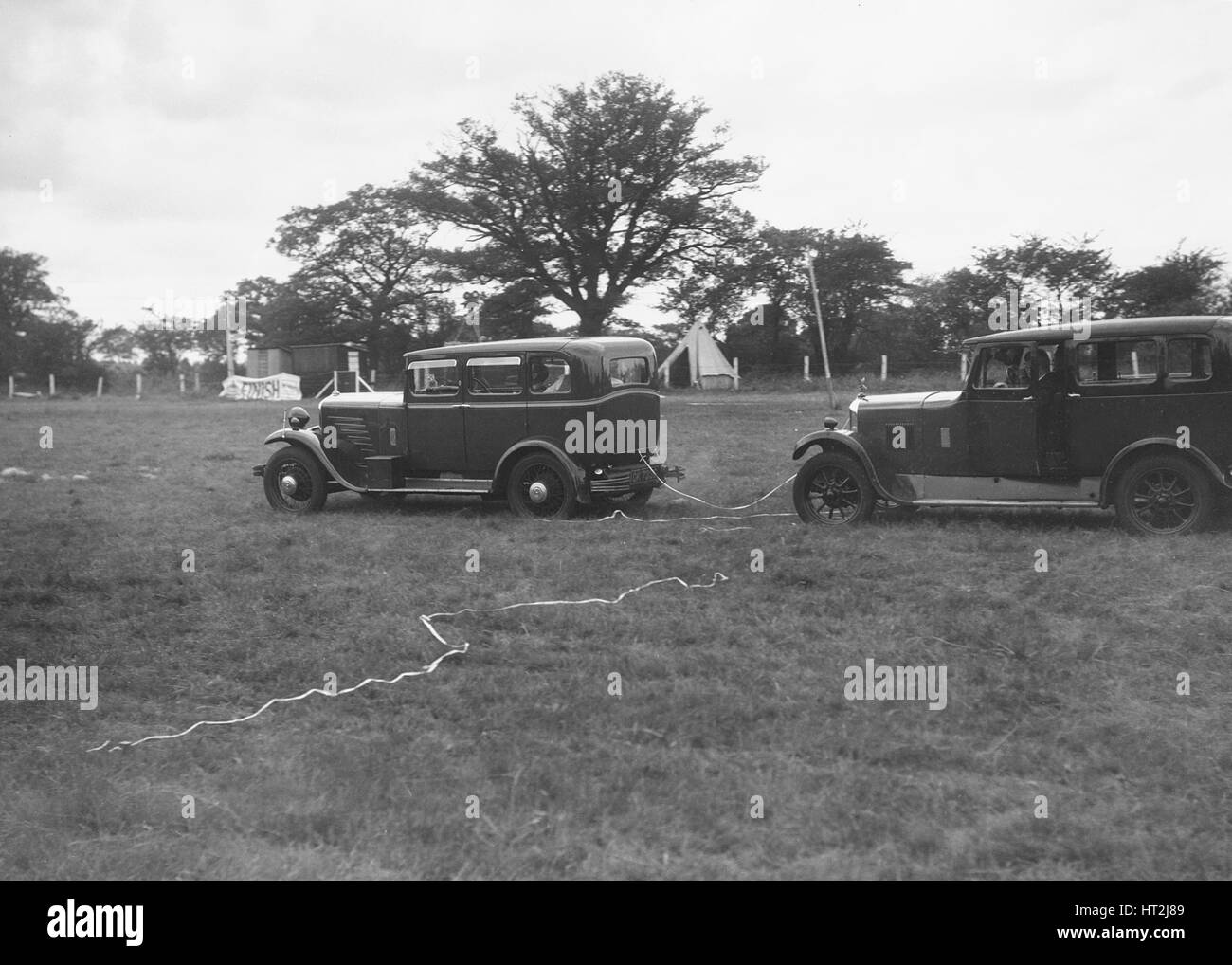 Singer Super Six and Singer Senior taking part in the Bugatti Owners Club gymkhana, 5 July 1931. Artist: Bill Brunell. Stock Photo