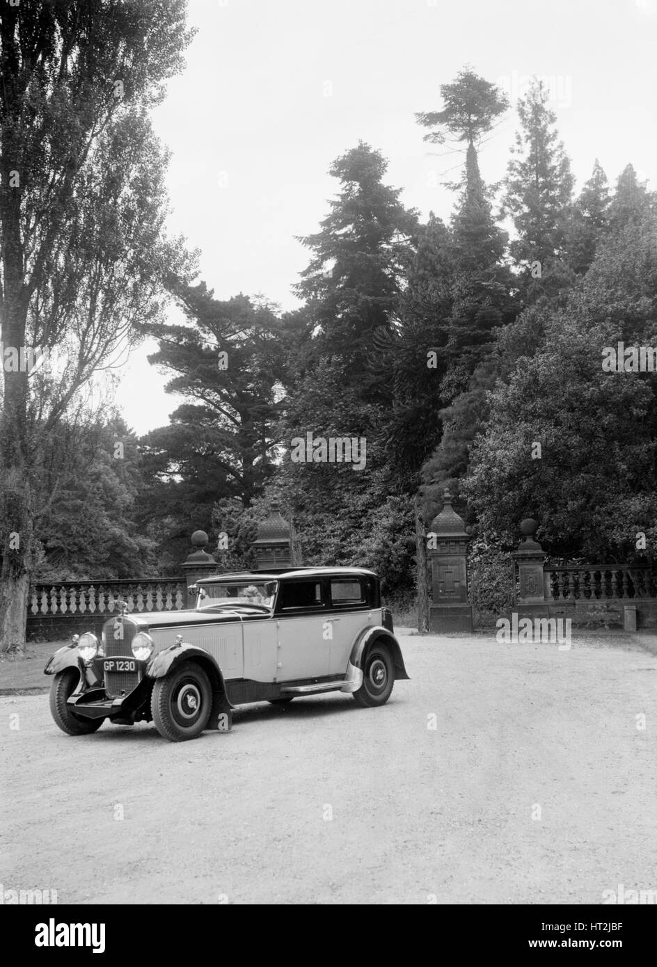 Kitty Brunell road testing a 1931 Delage D8, Wykehurst Place, Bolney, Sussex. Artist: Bill Brunell. Stock Photo