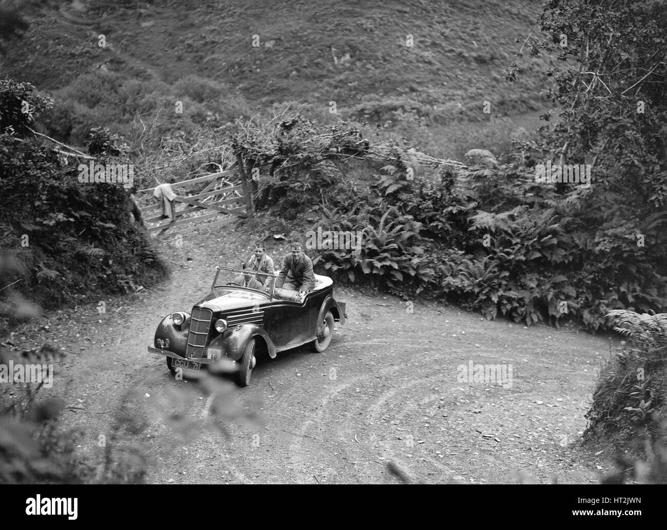 1935 Ford Ten tourer taking part in a motoring trial, late 1930s. Artist: Bill Brunell. Stock Photo
