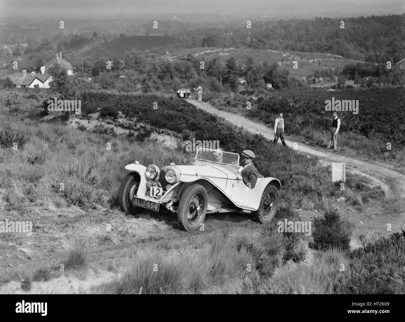 1935 Riley Imp 2-seater sports taking part in the NWLMC Lawrence Cup Trial, 1937. Artist: Bill Brunell. Stock Photo