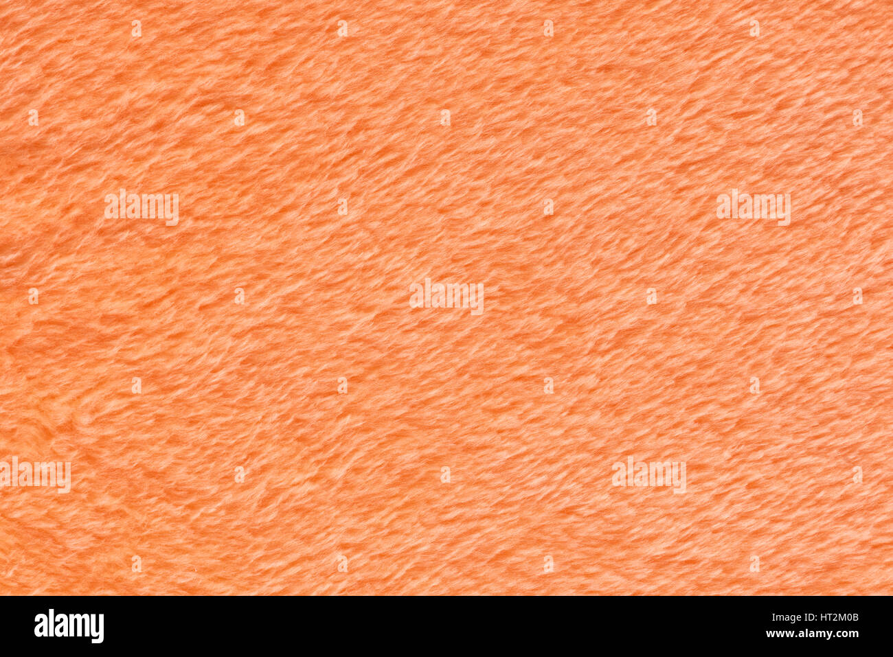 orange texture of towel like background, close up Stock Photo