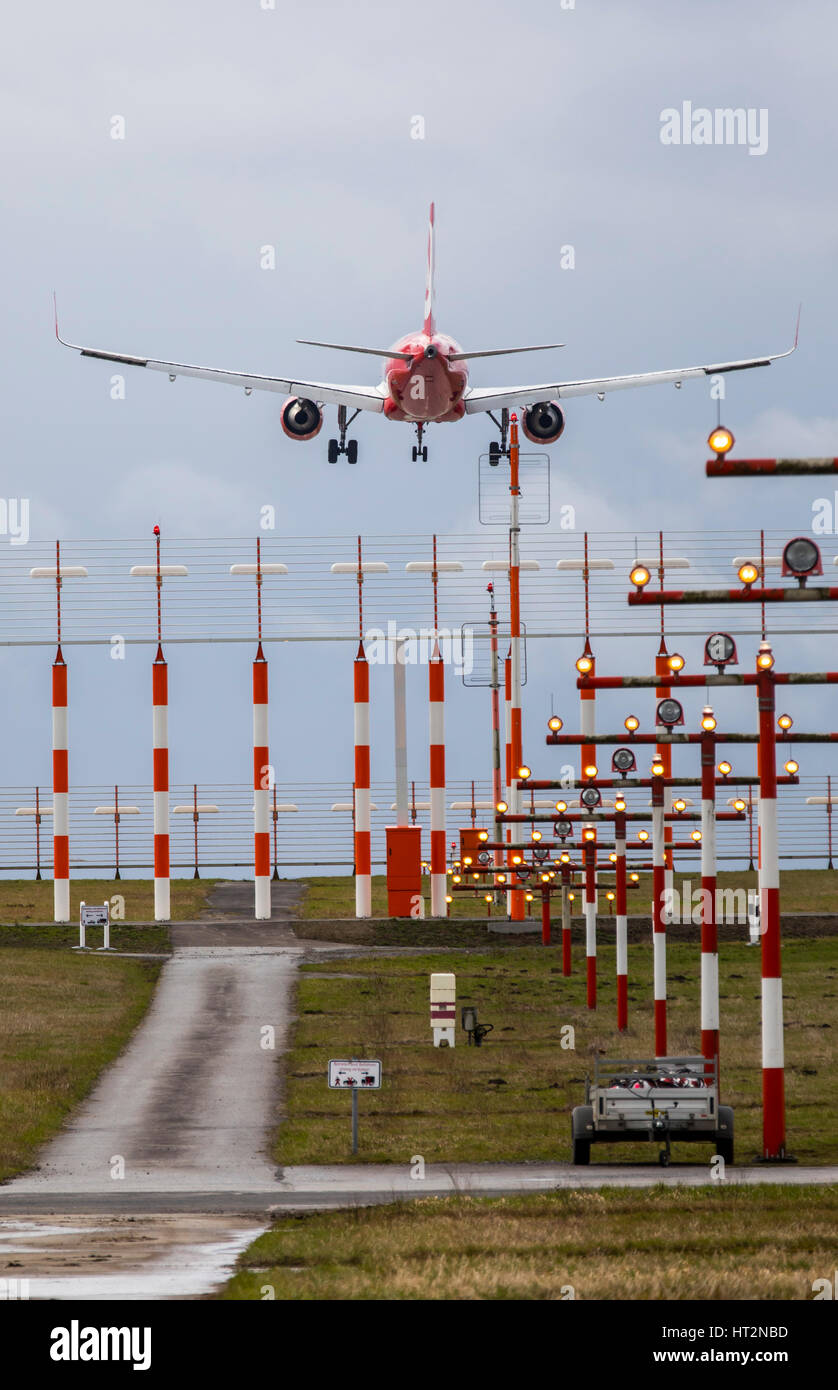 Aviation, plane at Landing approach to DŸsseldorf International Airport, Germany,  Landing runway lighting, Stock Photo