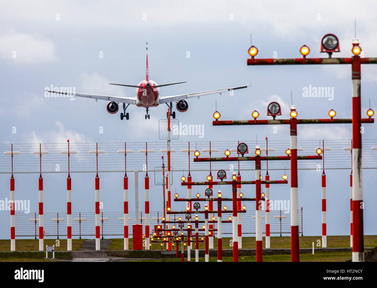 Aviation, plane at Landing approach to DŸsseldorf International Airport, Germany,  Landing runway lighting, Stock Photo