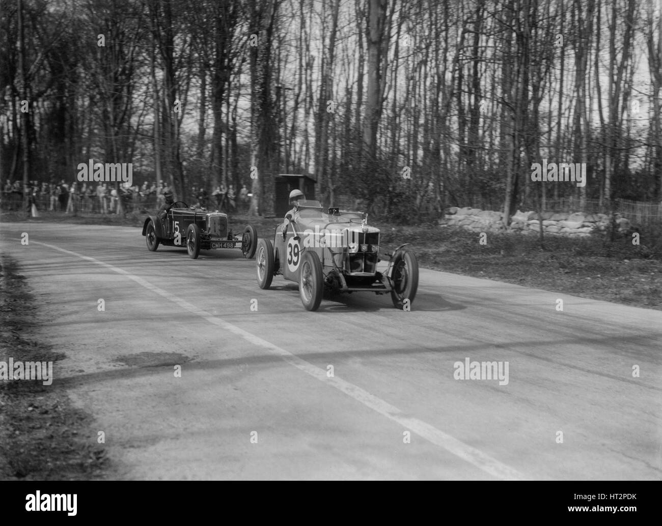 MG Magnette leading a Frazer-Nash Shelsley at Donington Park, Leicestershire, 1930s. Artist: Bill Brunell. Stock Photo