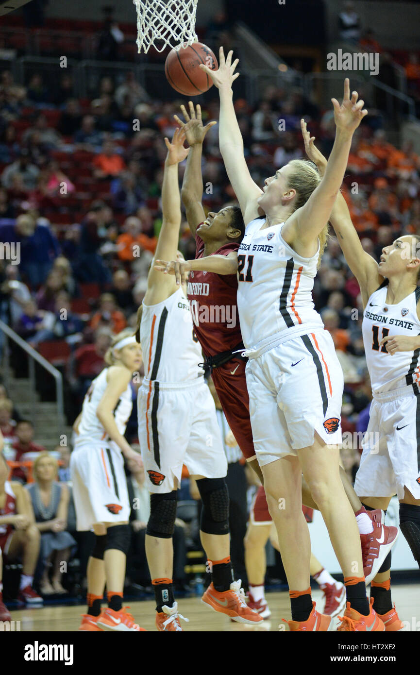 Seattle, WA, USA. 5th Mar, 2017. Stanford's Briana Roberson (10) puts up a shot down low against OSU's Mikayla Pivec (0) and Marie Gulich (21) during the PAC12 women's tournament final between the Oregon State Beavers and the Stanford Cardinal. The game was played at Key Arena in Seattle, WA. Jeff Halstead/CSM/Alamy Live News Stock Photo