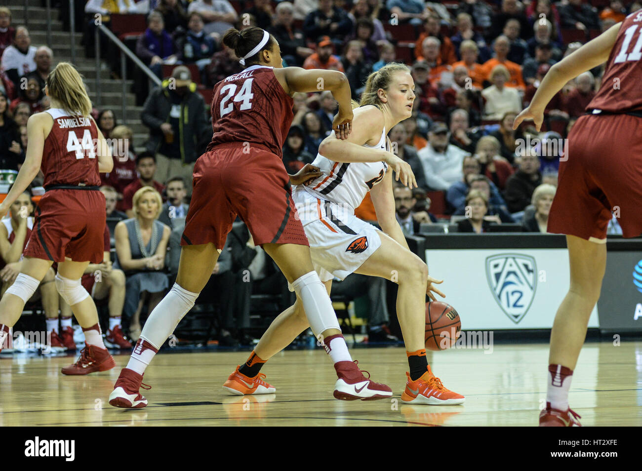 Seattle, WA, USA. 5th Mar, 2017. Stanford's Erica McCall (24) defends against OSU center Marie Gulich (21) during the PAC12 women's tournament final between the Oregon State Beavers and the Stanford Cardinal. Stanford won the game 48-43. The game was played at Key Arena in Seattle, WA. Jeff Halstead/CSM/Alamy Live News Stock Photo