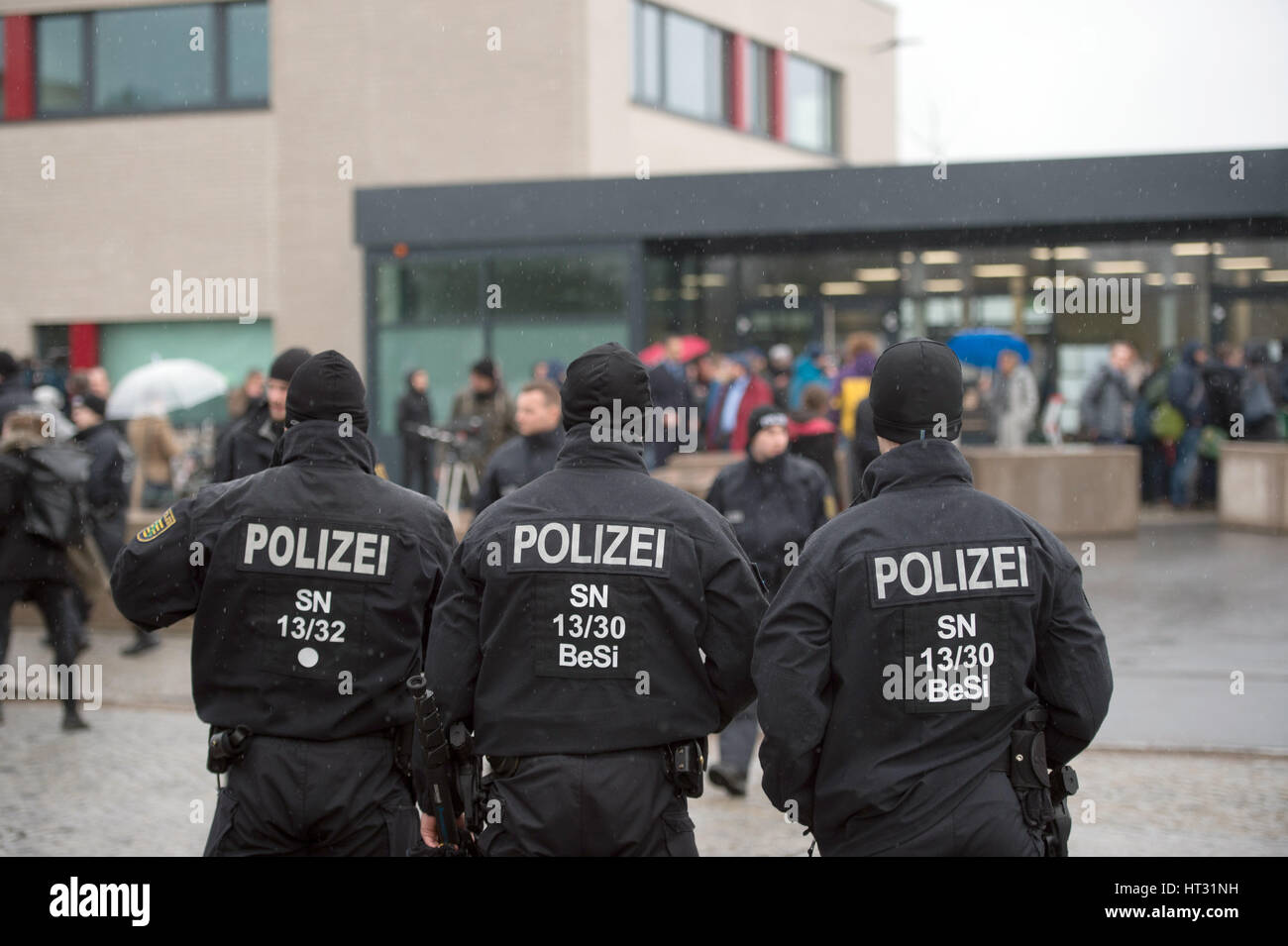 Dresden, Germany. 7th Mar, 2017. Police officers stand outside the