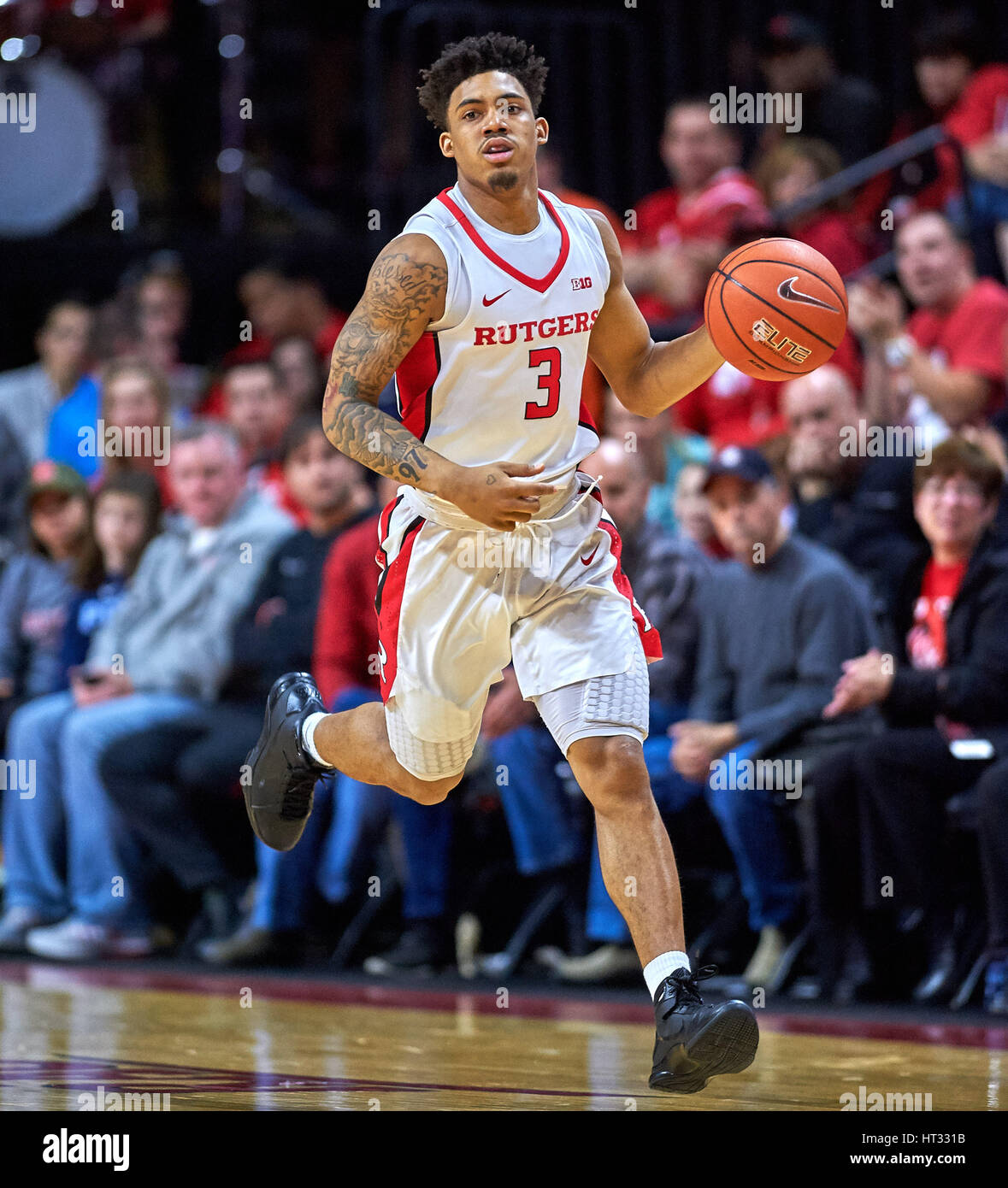 Rutgers' guard Corey Sanders (3) brings the ball up court in the Stock ...