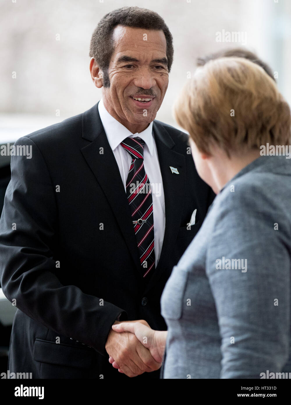 Berlin, Germany. 7th Mar, 2017. German chancellor Angela Merkel welcomes President Seretse Khama Ian Khama of Botswana (l.) at the German Chancellory in Berlin, Germany, 7 March 2017. Photo: Kay Nietfeld/dpa/Alamy Live News Stock Photo