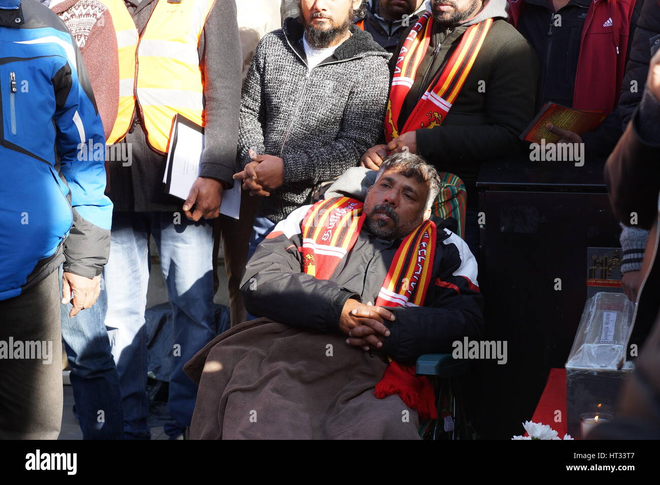 London, UK. 7th March 2017. Tamil activist Thiru Kumaran , here seen in chair, enters 10th day of hunger strike in Whitehall, opposite 10 Downing Street, to protest at alleged suppression and subjugation of Tamils, colonization and Sinhalisation in the northeast of Sri Lanka, as well as failure to release prisoners of war and address the issue of missing persons. The protest wishes the UK government to refer Sri Lanka to the UN General Assembly in March 2017. Credit: Peter Hogan/Alamy Live News Stock Photo