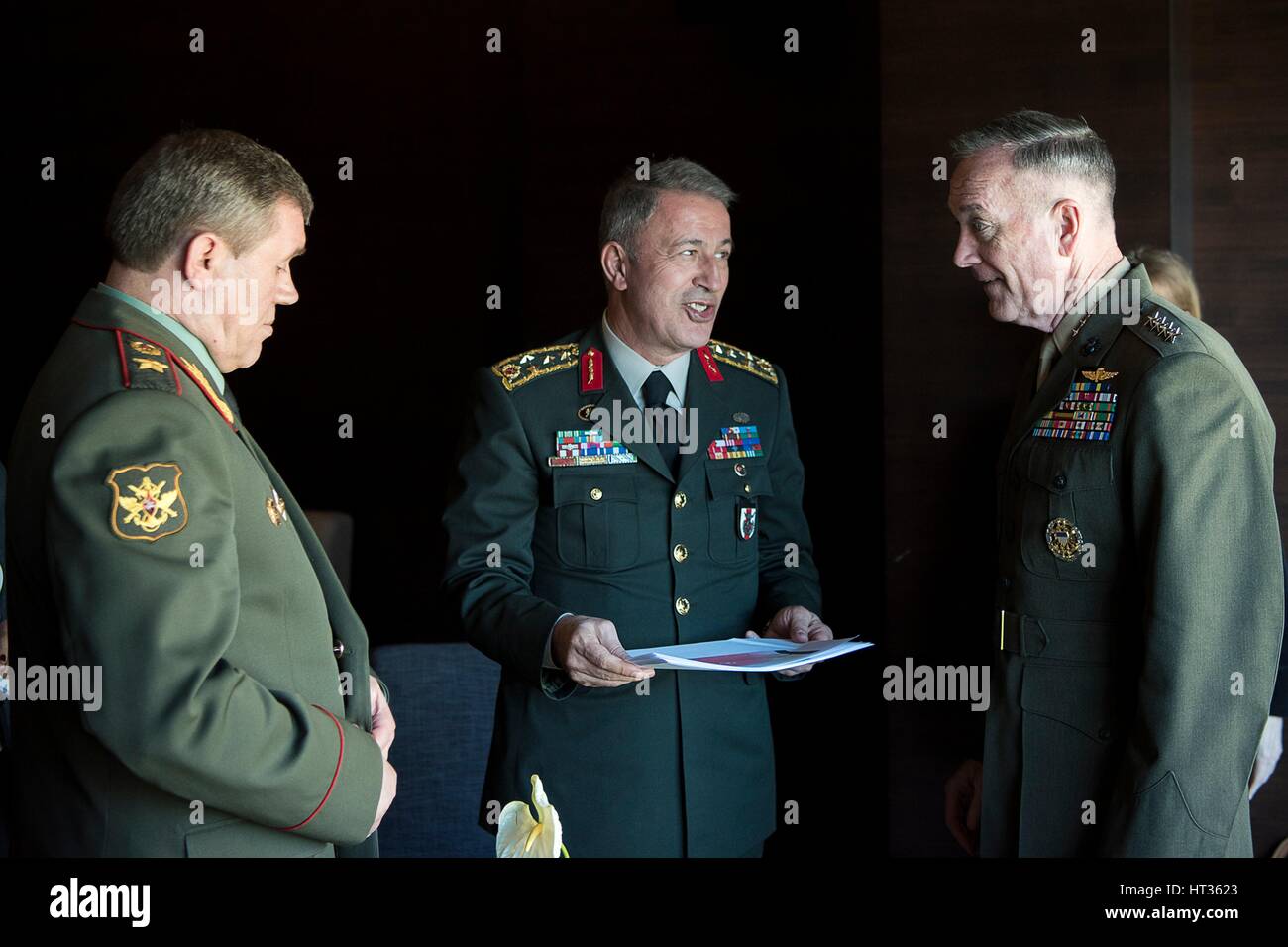 Antalya, Turkey. 7th Mar, 2017. U.S. Joint Chiefs Chairman Gen. Joseph Dunford, right, with Turkish Gen. Hulusi Akar and Russian Gen. Valery Gerasimov, left, during meetings March 7, 2017 in Antalya, Turkey. The three chiefs of defense are meeting to discuss operations in Syria. Credit: Planetpix/Alamy Live News Stock Photo