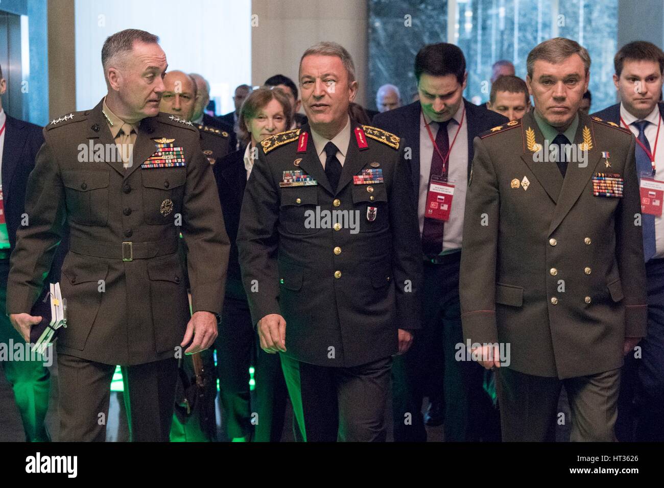 Antalya, Turkey. 7th Mar, 2017. U.S. Joint Chiefs Chairman Gen. Joseph Dunford, left, walks along with Turkish Gen. Hulusi Akar and Russian Gen. Valery Gerasimov, right, during meetings March 7, 2017 in Antalya, Turkey. The three chiefs of defense are meeting to discuss operations in Syria. Credit: Planetpix/Alamy Live News Stock Photo