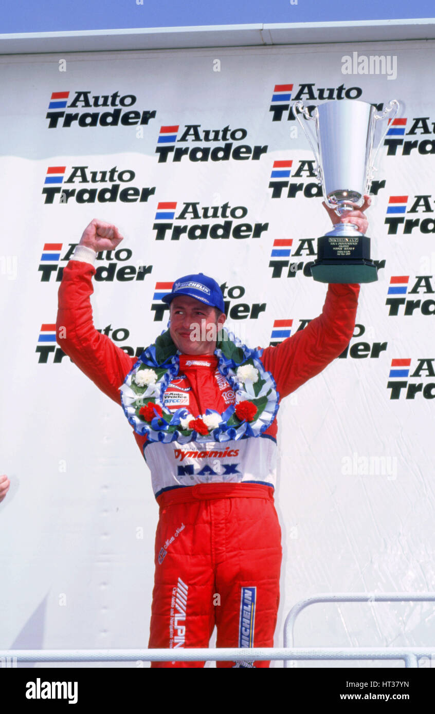 Matt Neal, Nissan driver, celebrates victory, 1999 British touring cars. Artist: Unknown. Stock Photo