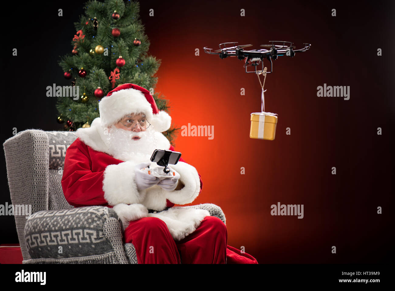 Santa Dron Santa Claus using drone Stock Photo - Alamy