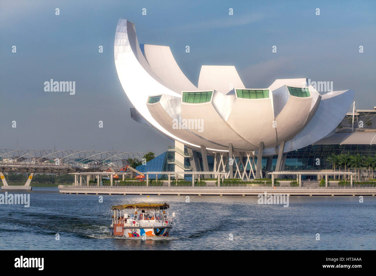 ArtScience Museum on Singapore River with boat, Singapore Stock Photo
