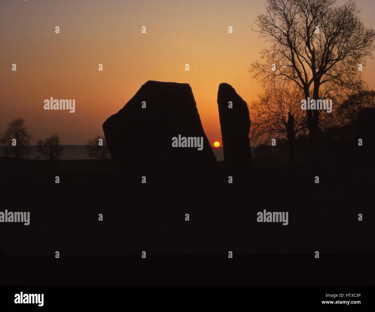 Sunrise on Megalithic Circle, Avebury, Wiltshire, 20th century. Artist: CM Dixon. Stock Photo