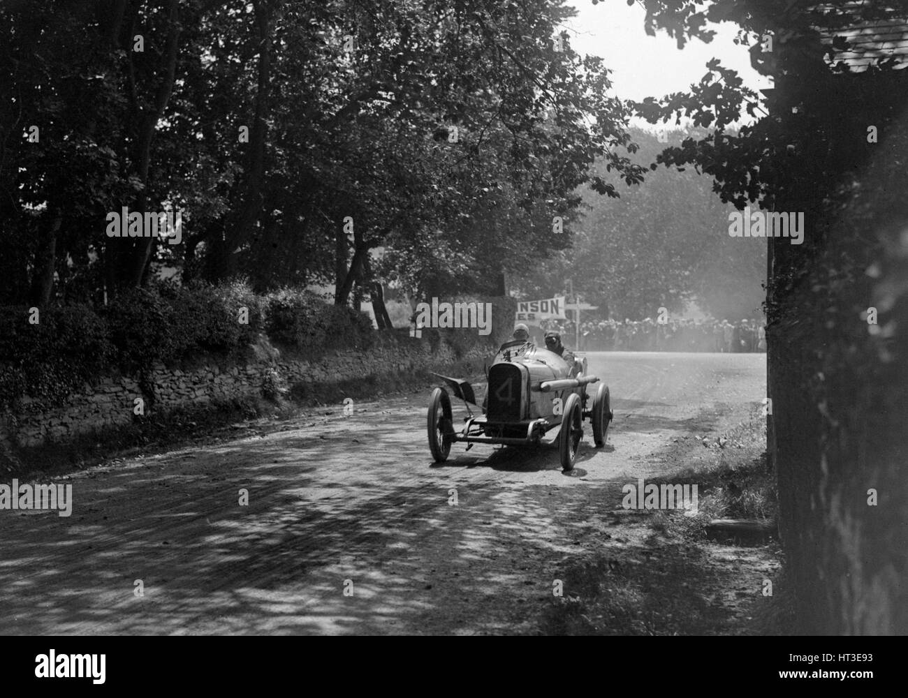 Kenelm Lee Guinness driving his Sunbeam to victory in the RAC Isle of Man TT race, 10 June 1914. Artist: Bill Brunell. Stock Photo