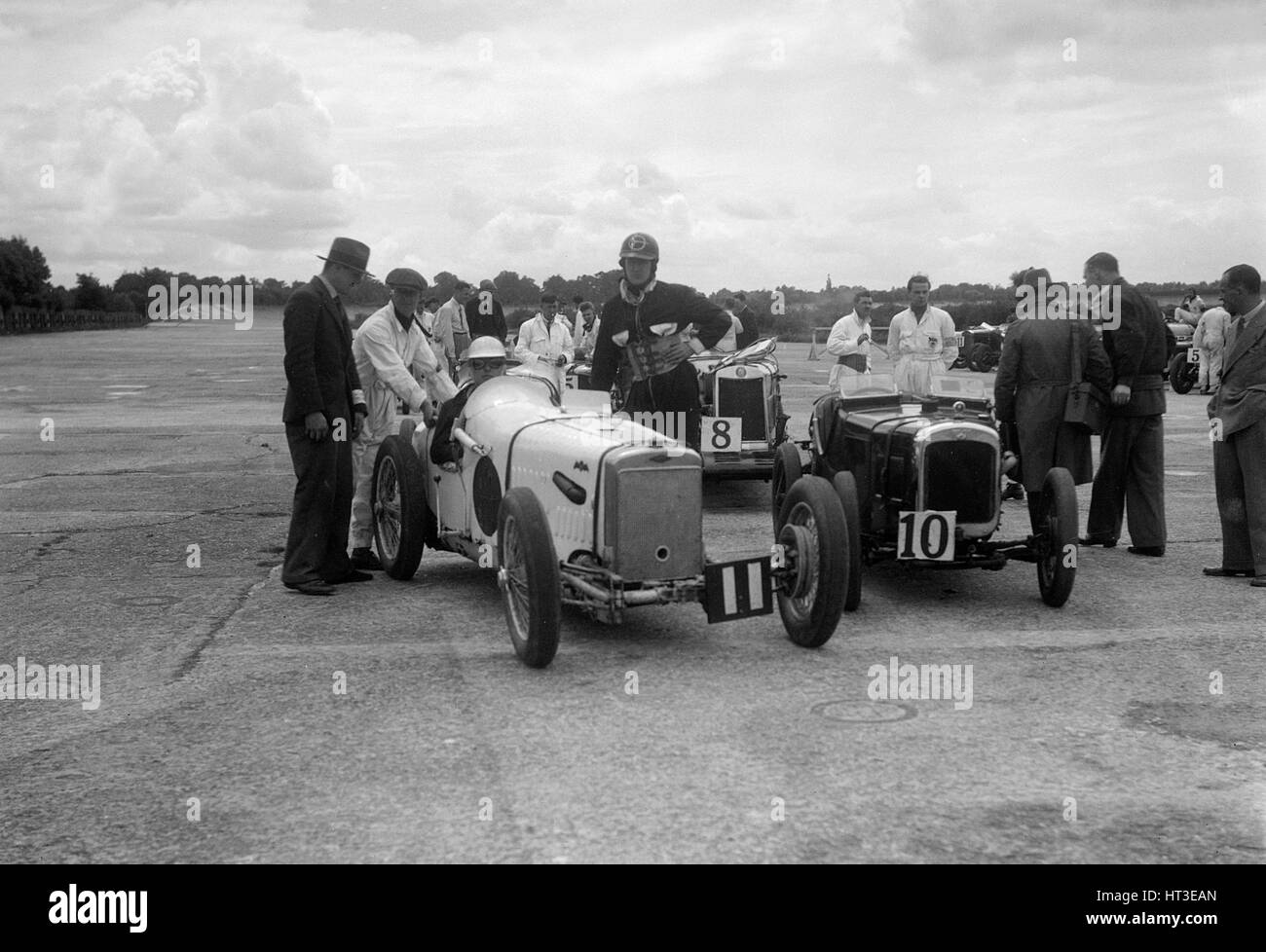 Frazer-Nash, Lea-Francis and Austin 7 at the LCC Relay GP, Brooklands, 25 July 1931. Artist: Bill Brunell. Stock Photo