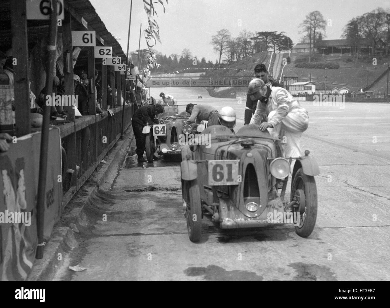 MG C types at the JCC Double Twelve race, Brooklands, 8/9 May 1931. Artist: Bill Brunell. Stock Photo