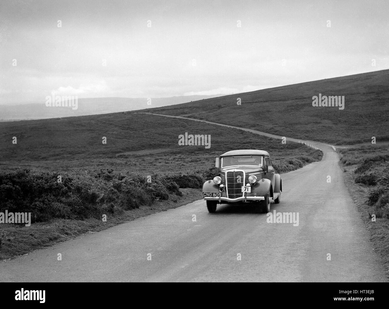 DJH Currie's Ford V8, winner of a silver award at the MCC Torquay Rally, July 1937. Artist: Bill Brunell. Stock Photo