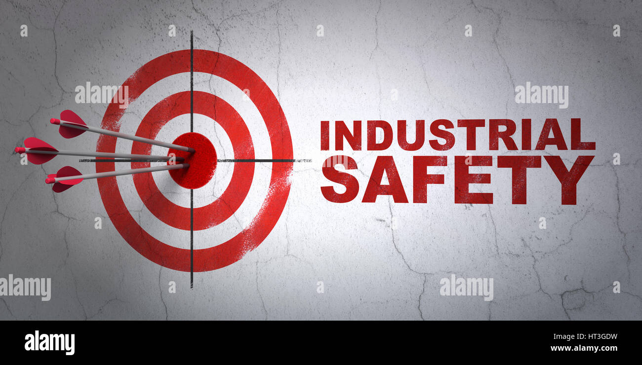 Constructing concept: target and Industrial Safety on wall background ...