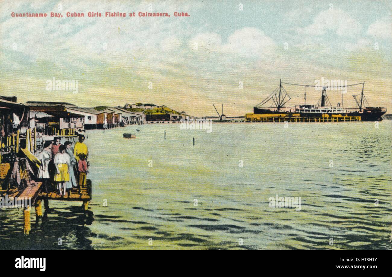 'Guantanamo Bay, Cuban Girls Fishing at Caimanera, Cuba', c1910. Artist: Unknown. Stock Photo