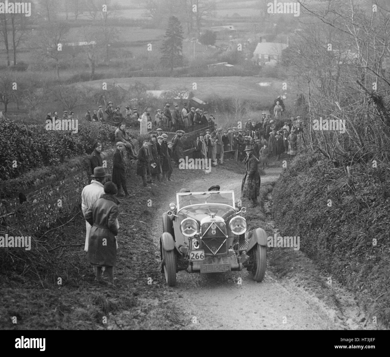 Lagonda of WM Couper performing a braking test, MCC Exeter Trial, Ibberton Hill, Dorset, 1930. Artist: Bill Brunell. Stock Photo