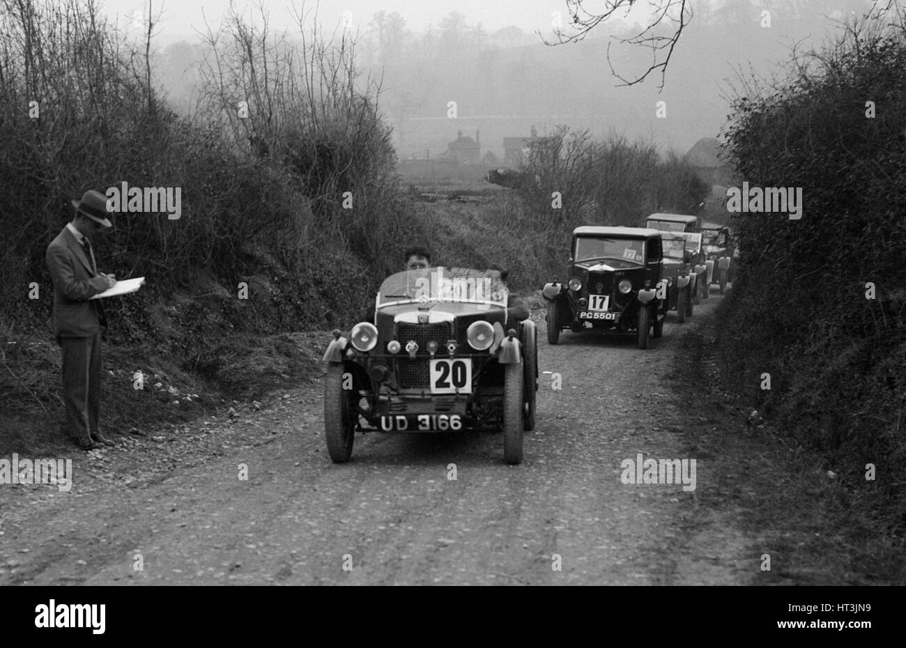 MG M Type and Riley saloon competing in the JCC Half-Day Trial, 1930. Artist: Bill Brunell. Stock Photo