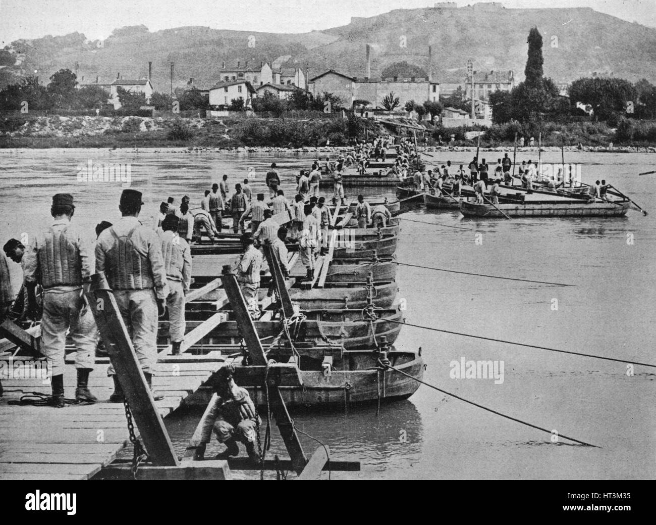 'Building a pontoon bridge over a French stream', 1915. Artist: Unknown. Stock Photo