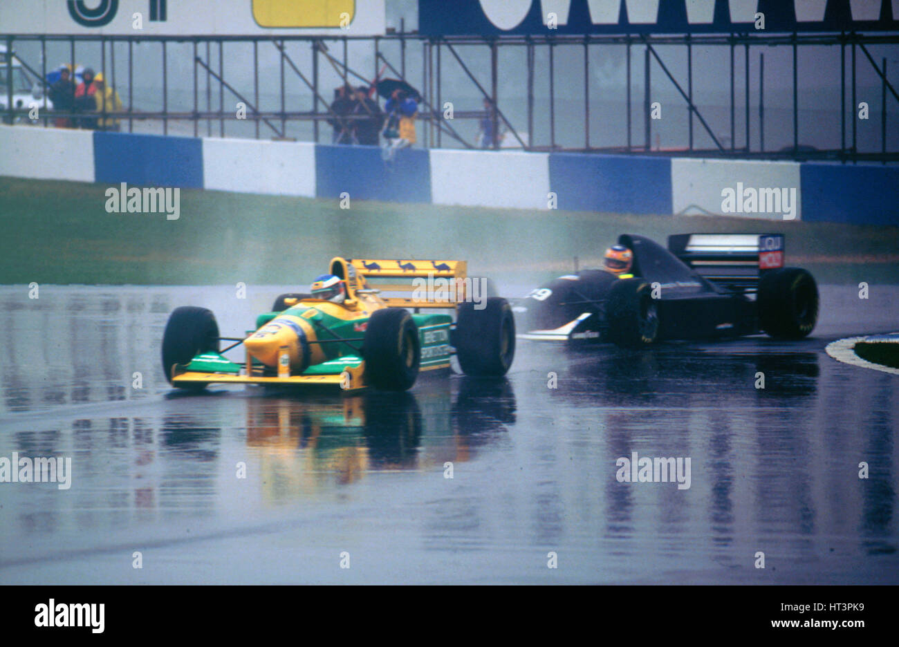 Benetton B193A Michael Schumacher and K.Wendlinger in Sauber Ilmor 1993 Euro GP at Donington Artist: Unknown. Stock Photo