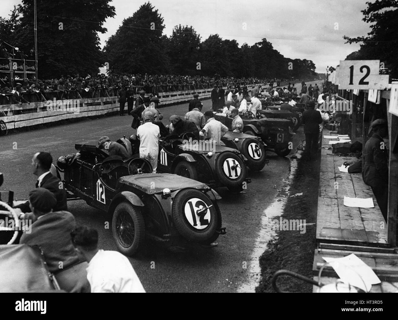 1930 O.M. works cars ready for start of 1930 Irish Grand Prix Artist: Unknown. Stock Photo