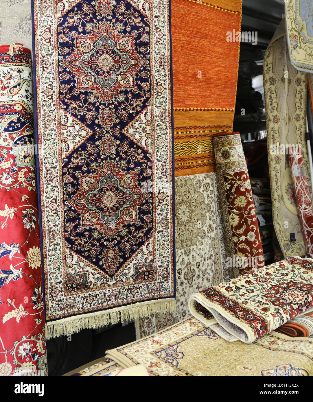 many carpets for sale in the ethnic market stall Stock Photo Alamy