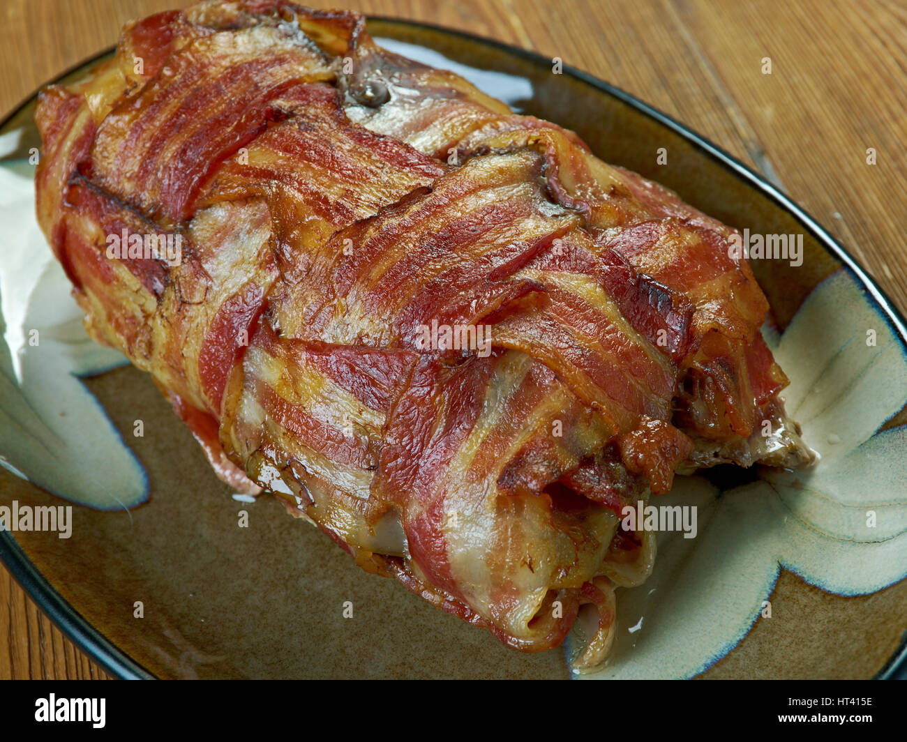 Bacon explosion pork dish that consists of bacon wrapped around a