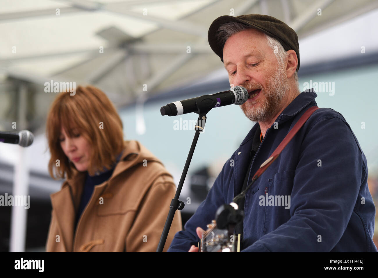 Billy Bragg and Beth Orton at the March 4 Women on International Womens Day, organised by CARE International and held in The Scoop, City Hall, London Stock Photo