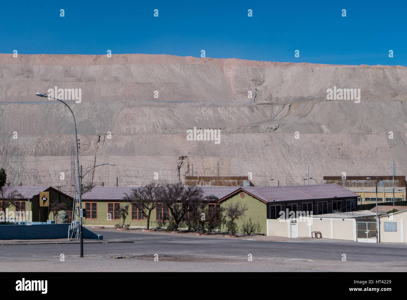 Chuquicamata town, once a thriving company town with banks, restaurants and playgrounds, but which has since been evacuated due to legal and health is Stock Photo