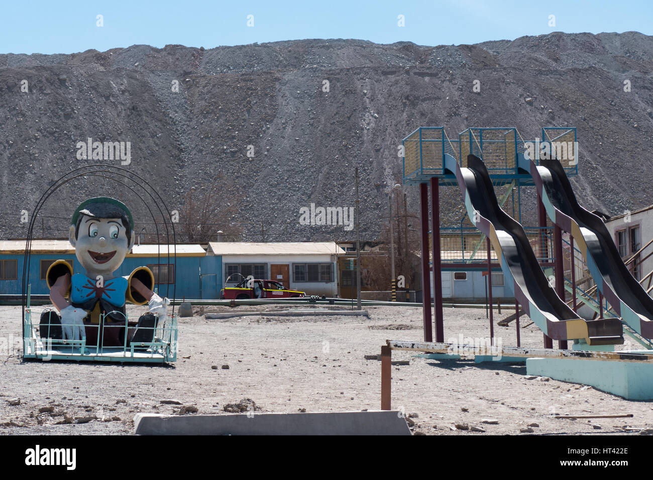 Chuquicamata town, once a thriving company town with banks, restaurants and playgrounds, but which has since been evacuated due to legal and health is Stock Photo