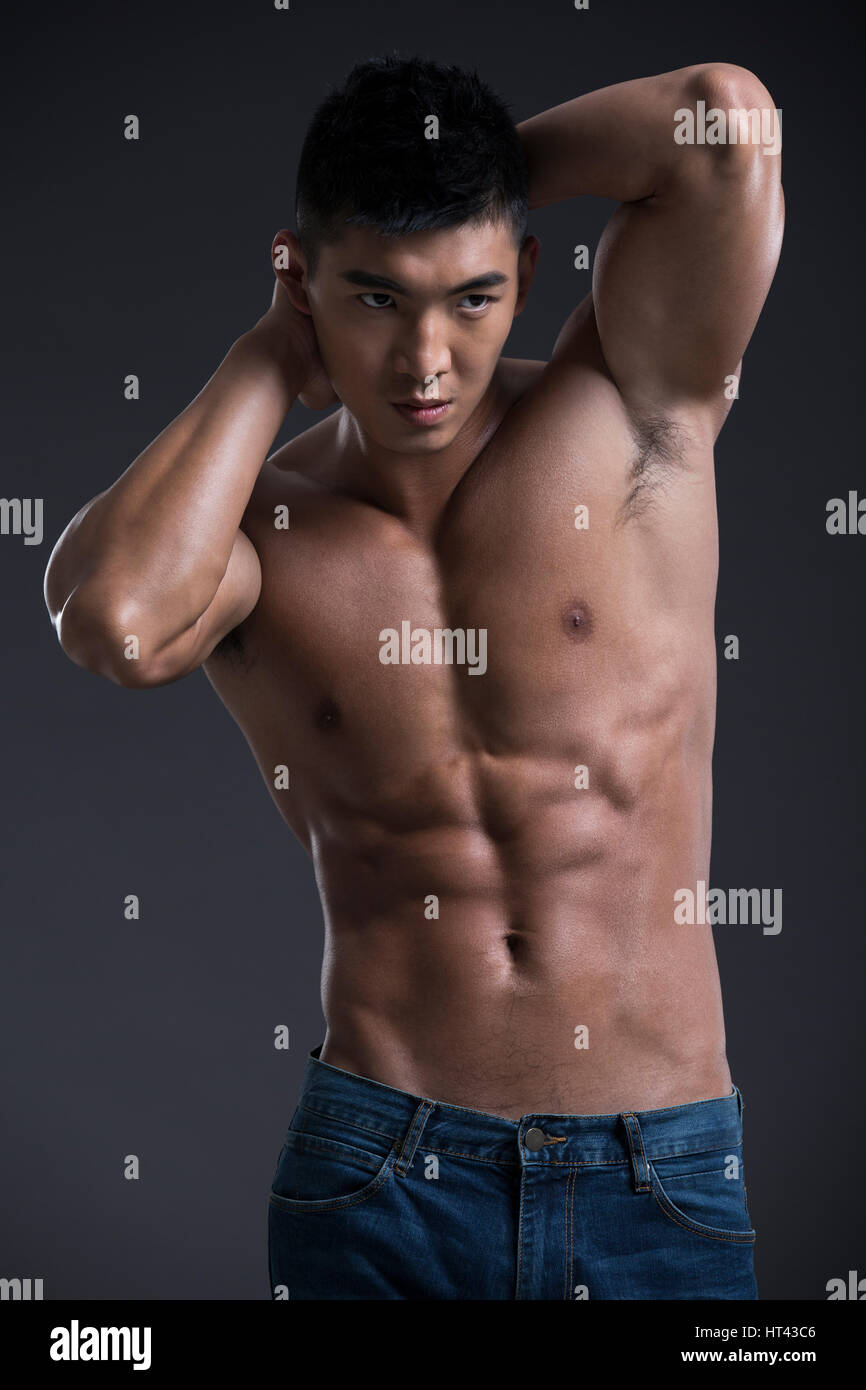 Young muscular man Stock Photo - Alamy