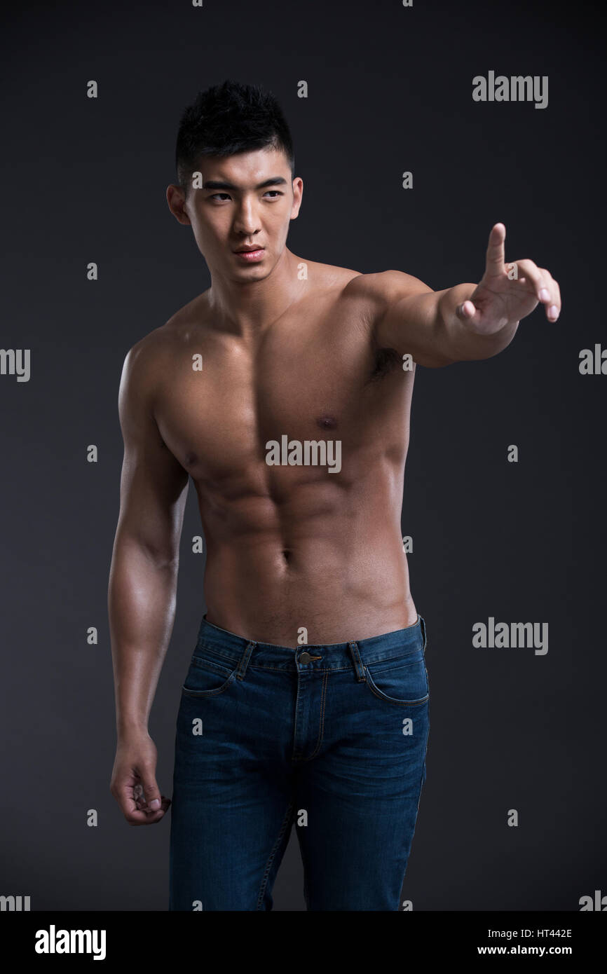 Young muscular man Stock Photo - Alamy