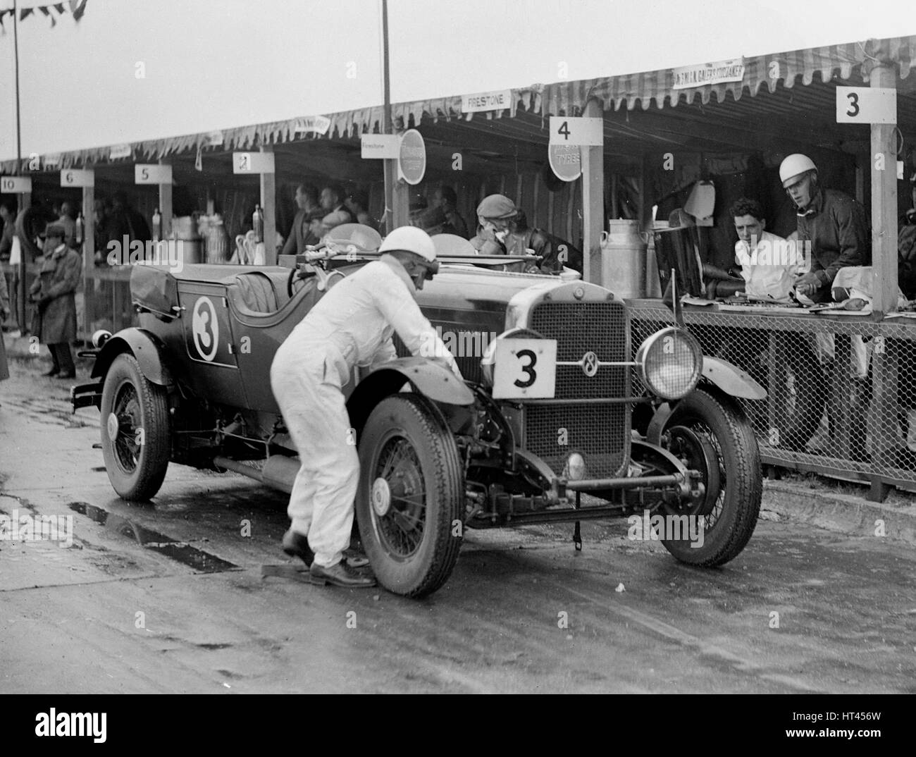 Studebaker of A Hollidge and GAW Laird in the pits at the JCC Double Twelve Race, Brooklands, 1929. Artist: Bill Brunell. Stock Photo