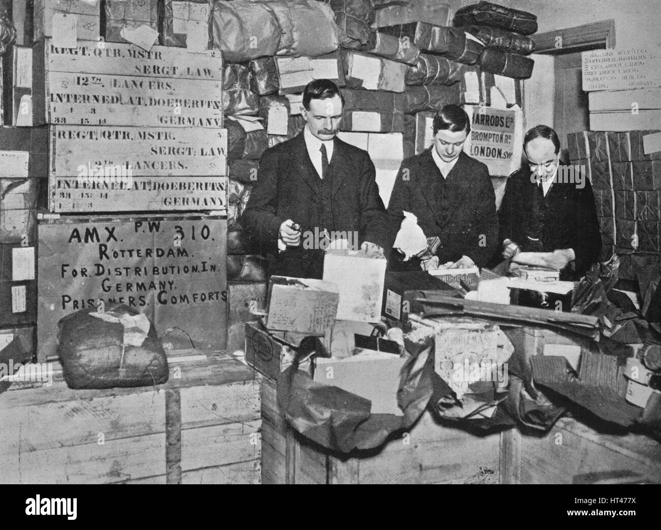 'Packing gifts for despatch to British prisoners in Germany', 1915. Artist: Unknown. Stock Photo