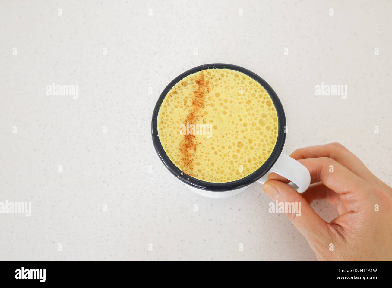 Turmeric latte, Golden milk, Turmeric milk, healthy hipster drink Stock