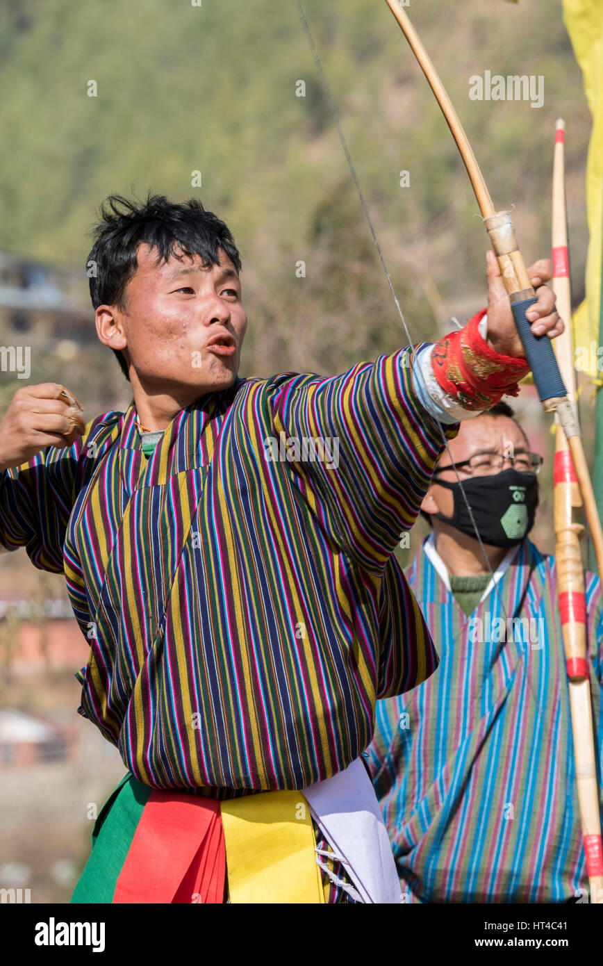 Bhutan, Thimphu, capital of Bhutan. Local archery competition played in
