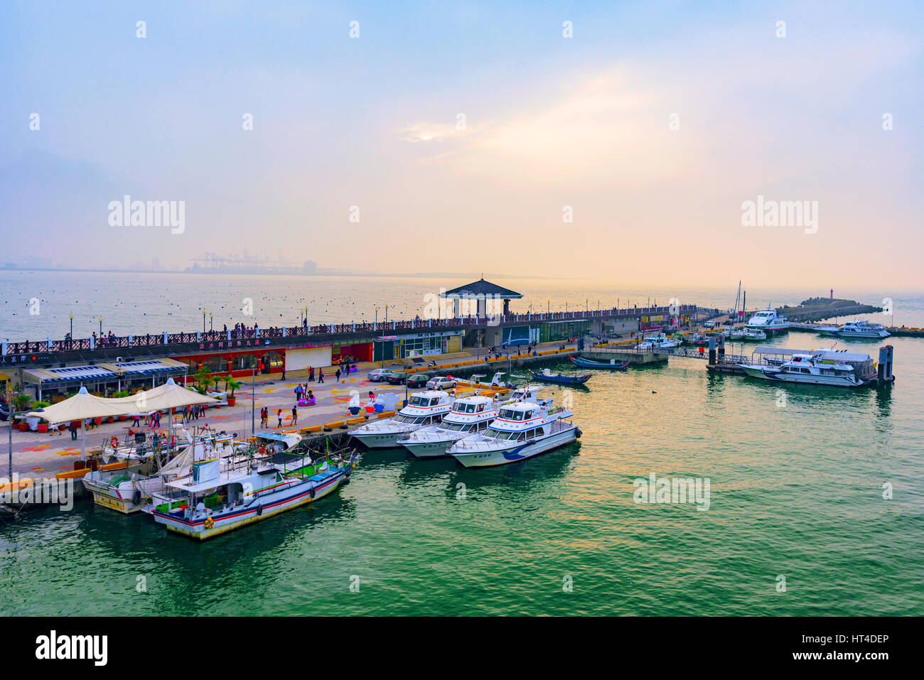 TAIPEI, TAIWAN - JANUARY 05: View of Fisherman's wharf waterfront area a popular travel destination on a misty day during sunset  on January 05, 2017  Stock Photo