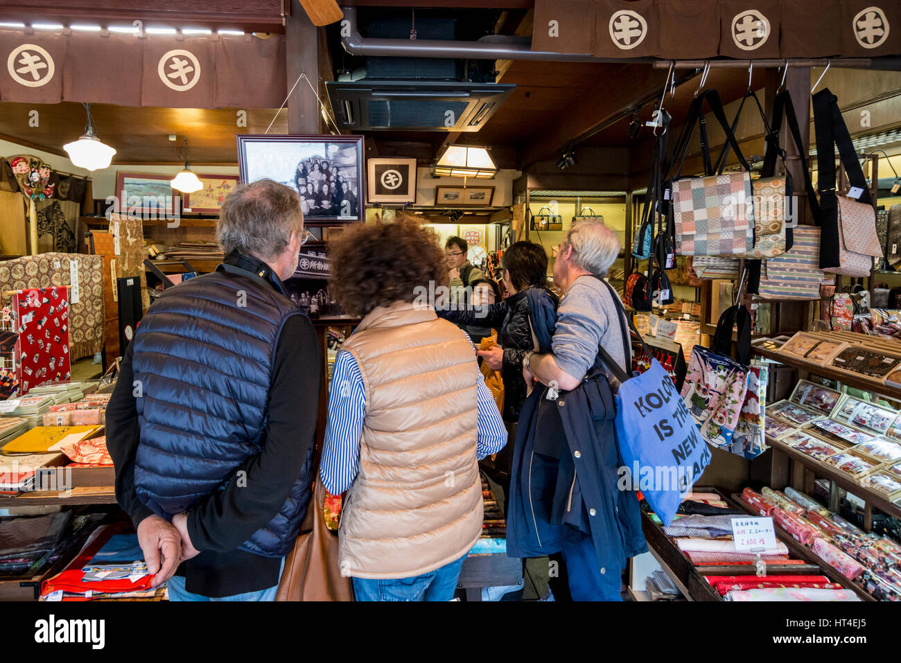 Shoppers, tourists in a souvenir shop selling Japanese artefacts, Kyoto, Japan Stock Photo