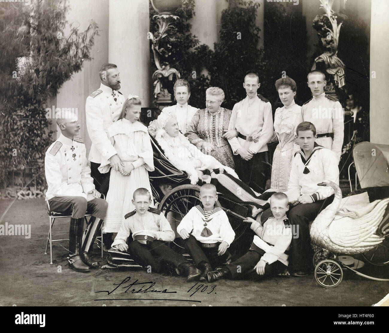 Portrait of  Alexandra Iosifovna of Russia with her family at Strelna (1903) Stock Photo