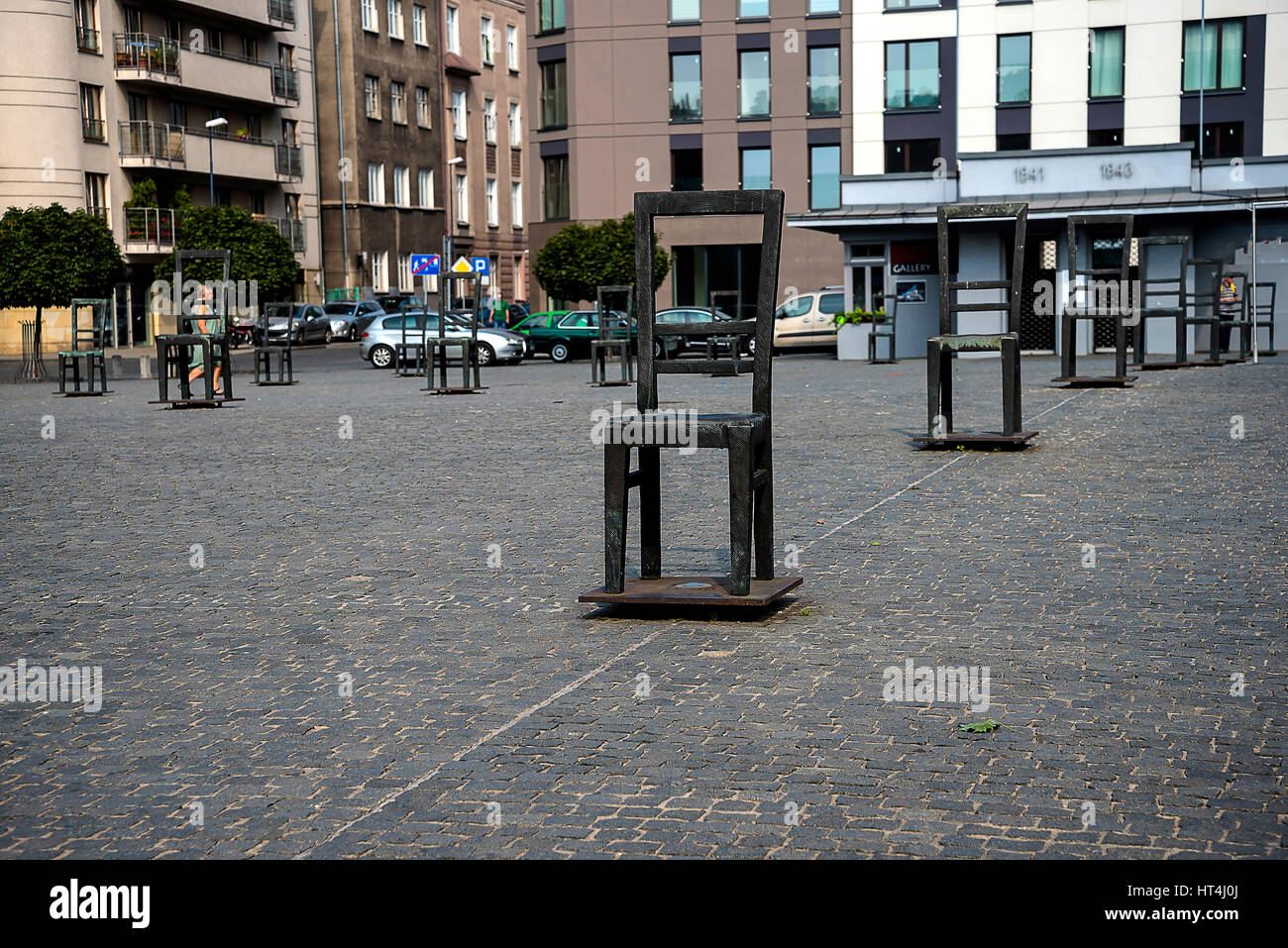 The Square of Empty Chairs in Krakow Poland is a group of Bronze