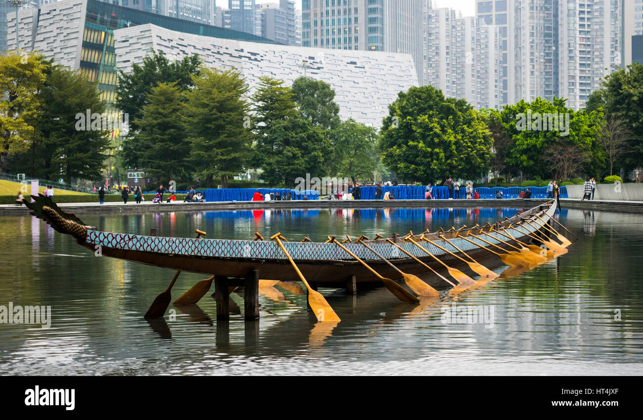 Stationary Chinese dragon boat in small pond in China Stock Photo