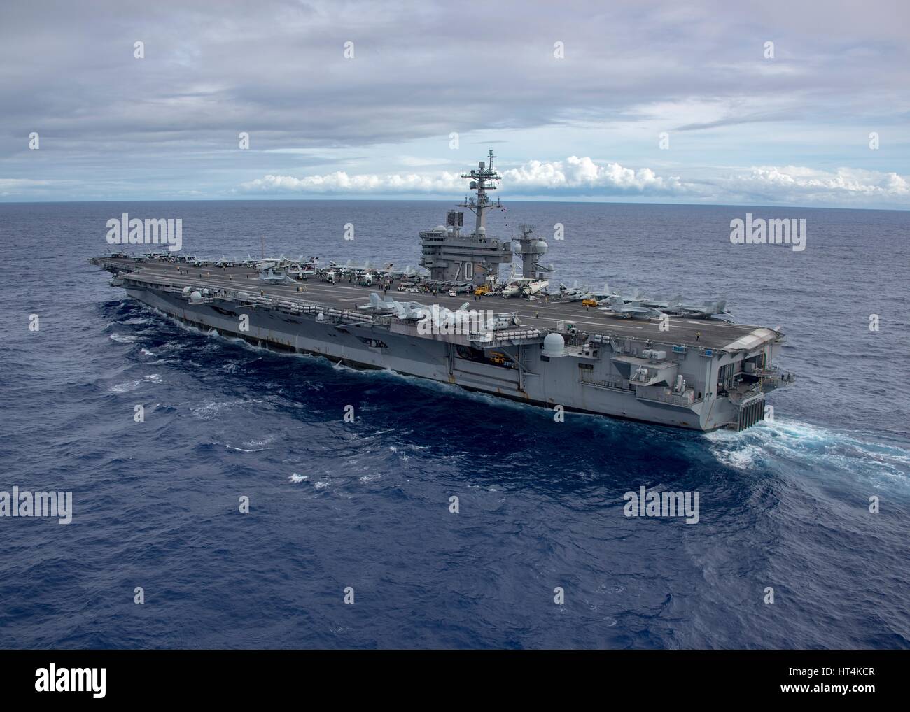 The USN Nimitz-class aircraft carrier USS Carl Vinson steams underway February 4, 2017 in the Pacific Ocean. Stock Photo