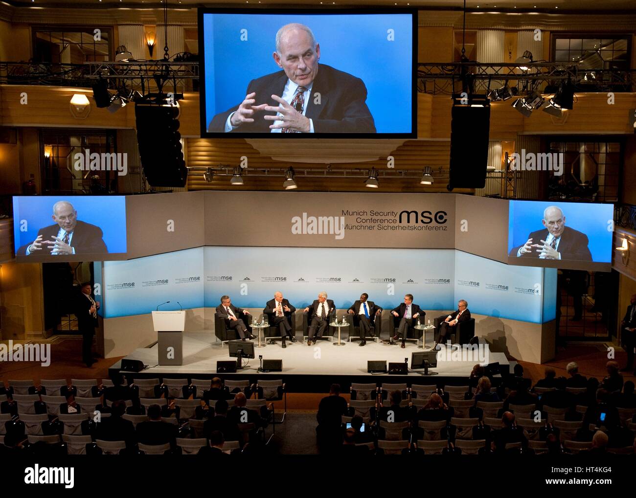 German Federal Minister of the Interior Thomas de Maiziere (left), U.S. Homeland Security Secretary John Kelly, Pakistani Minister of Defense Khawaja Muhammad Asif, Nigerian Adviser to the President Babagana Monguno, and European Union Security Union Commissioner Sir Julian King participate in a global forum discussion during the 2017 Munich Security Conference February 18, 2017 in Munich, Germany. Stock Photo